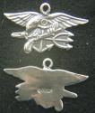 This is the US Navy Seal insignia in a chrarm made in sterling silver. It is hal